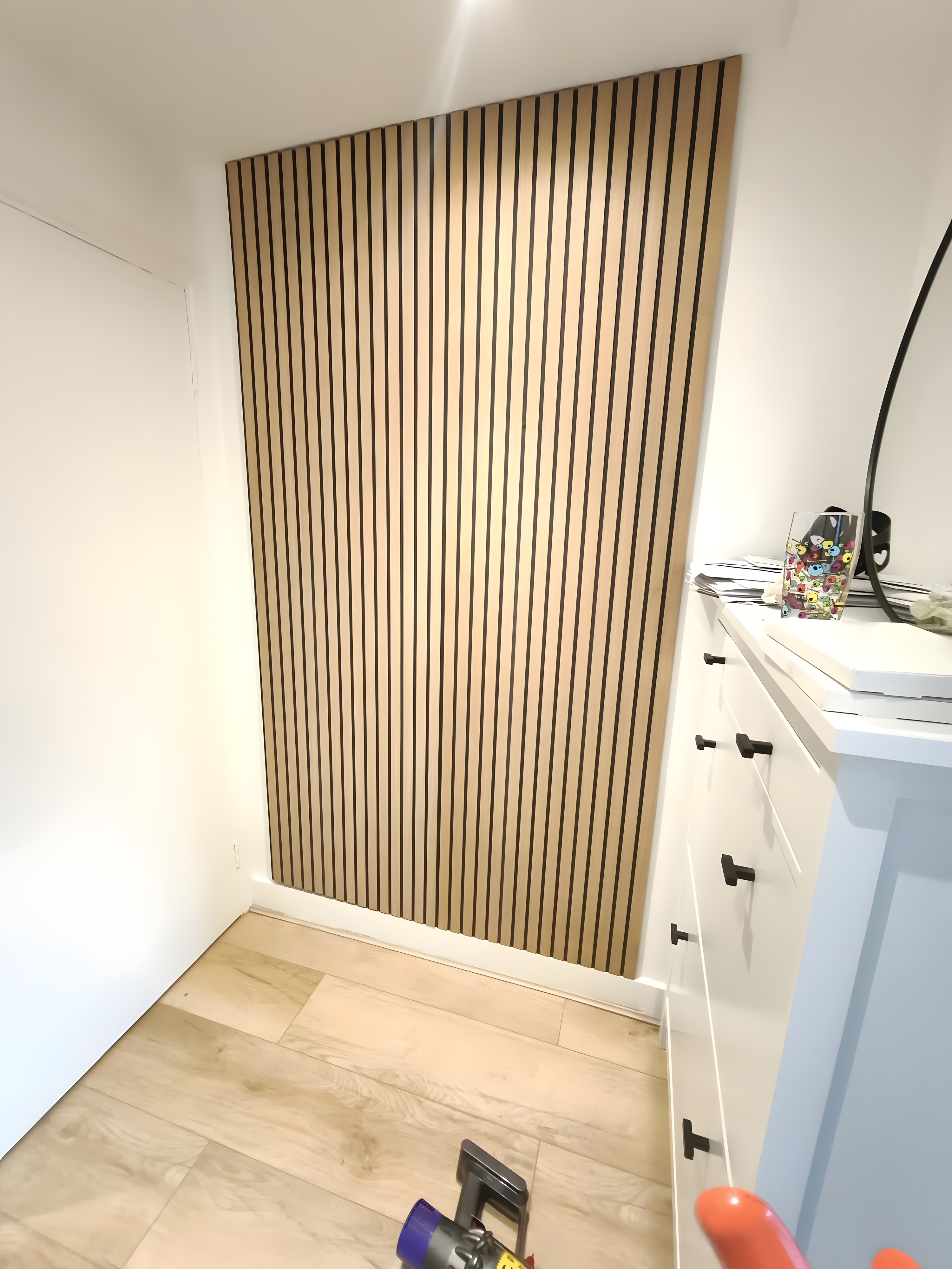 Oak slat wood feature wall fitted by Elite Home Fixer